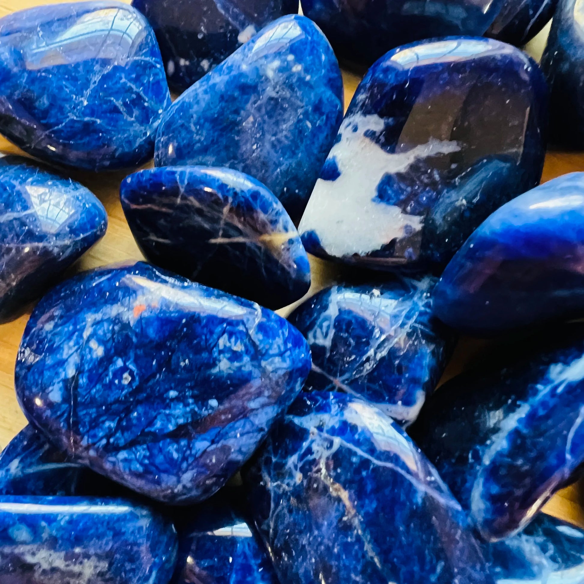 Magnified detail of Sodalite tumbled stone, traditionally used for Focus.
