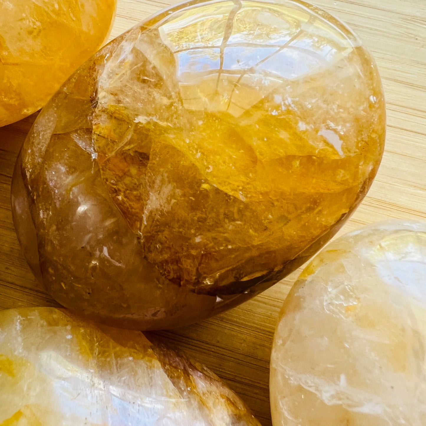 Bottom side of Grade AA Golden Healer palm stone, Madagascar-sourced.