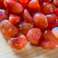 Full profile of Grade AA Carnelian tumbled stone ready to ship from Beyond Bohemian