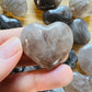 Rear view of brown Smoky Quartz polished heart, from Vakinankaratra, Madagascar.
