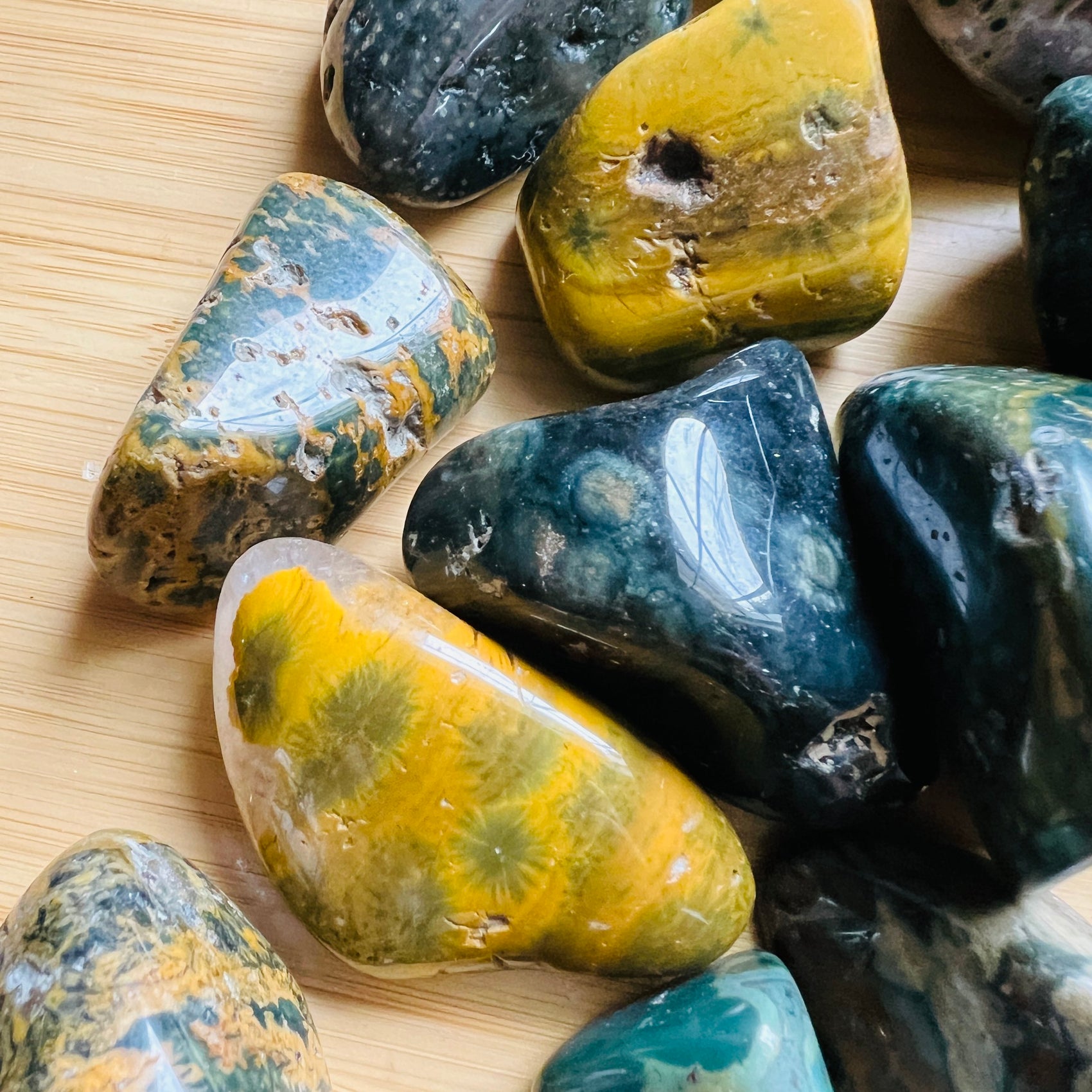 Surface detail of Ocean Jasper tumbled stone, kept close for Emotional Healing, from Sofia, Madagascar.