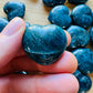 Lifestyle context of Apatite stone, shown for size reference.