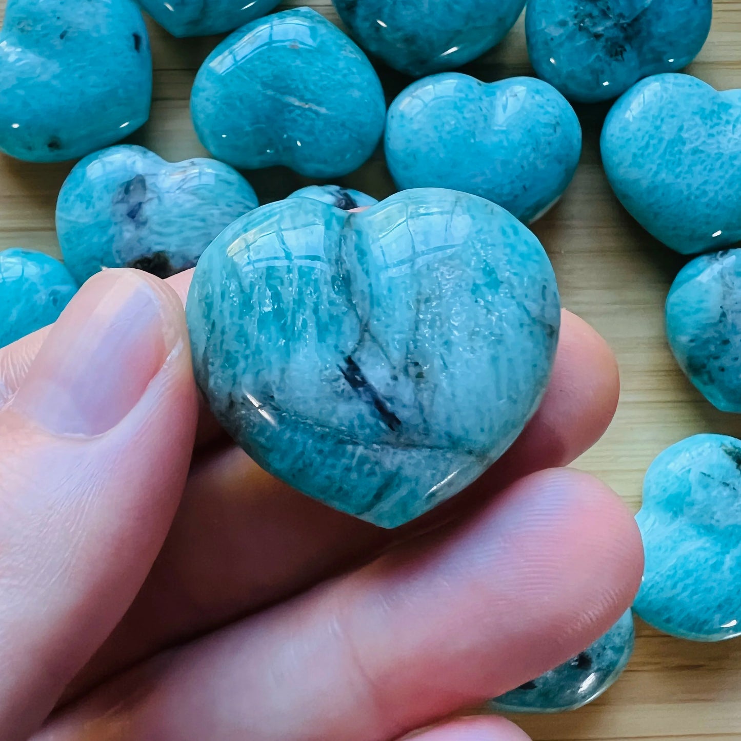 Back view of Grade AA Amazonite heart showing natural surface