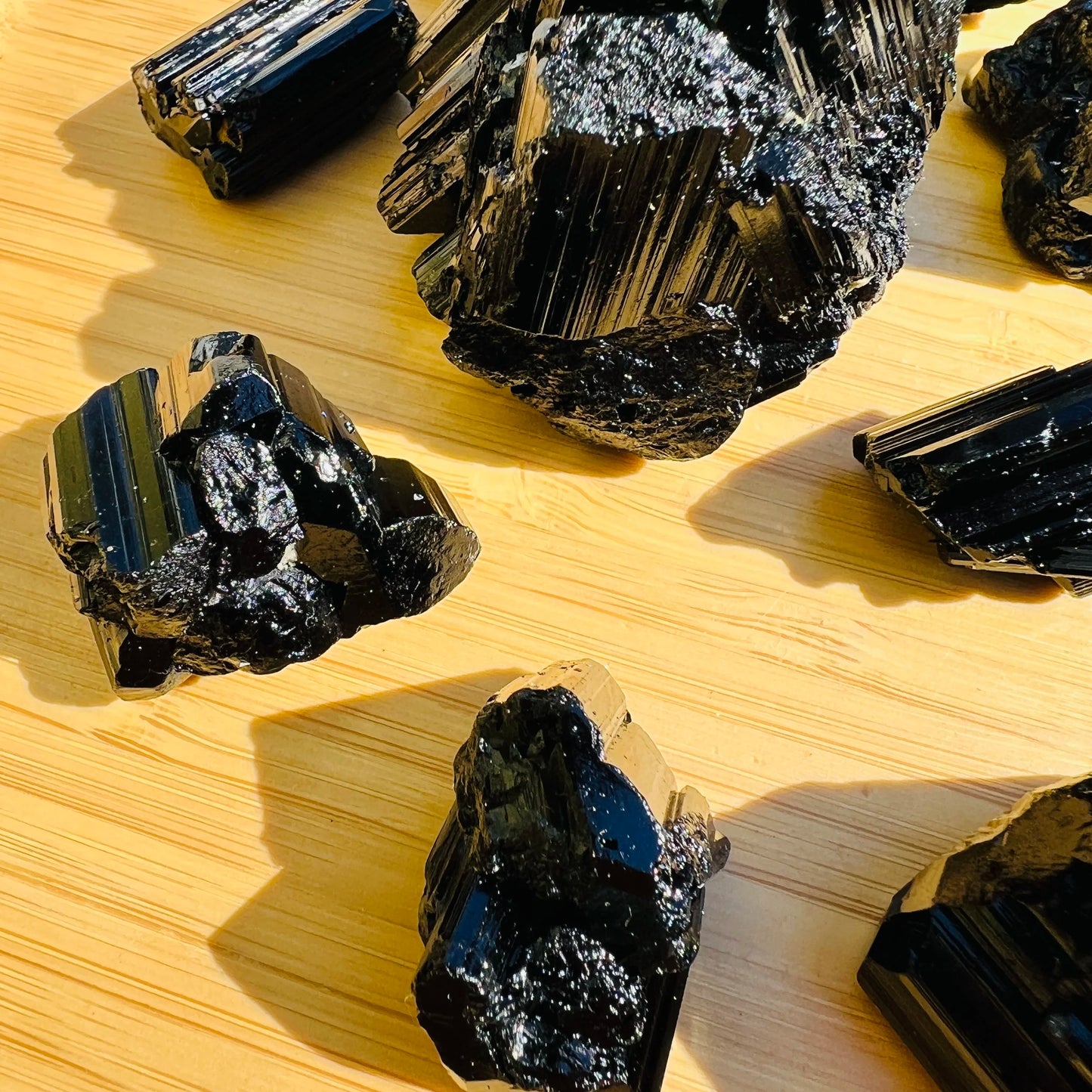 Alternate angle of Grade AAA Black Tourmaline raw showing overall shape
