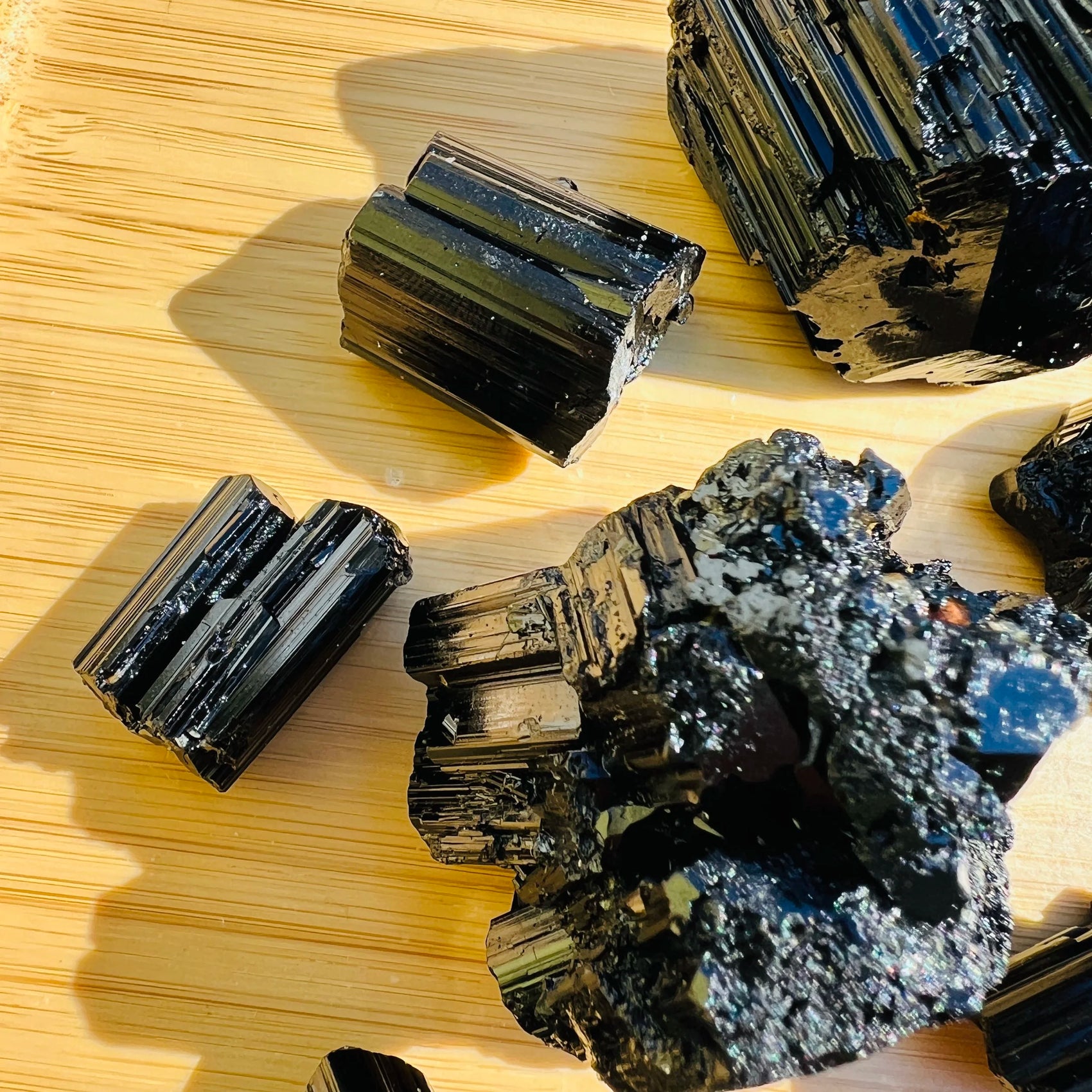 Close-up of Black Tourmaline raw crystal from Madagascar, soothing wellness stone for Stress Relief
