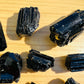 Back view of Grade AAA Black Tourmaline raw showing natural surface