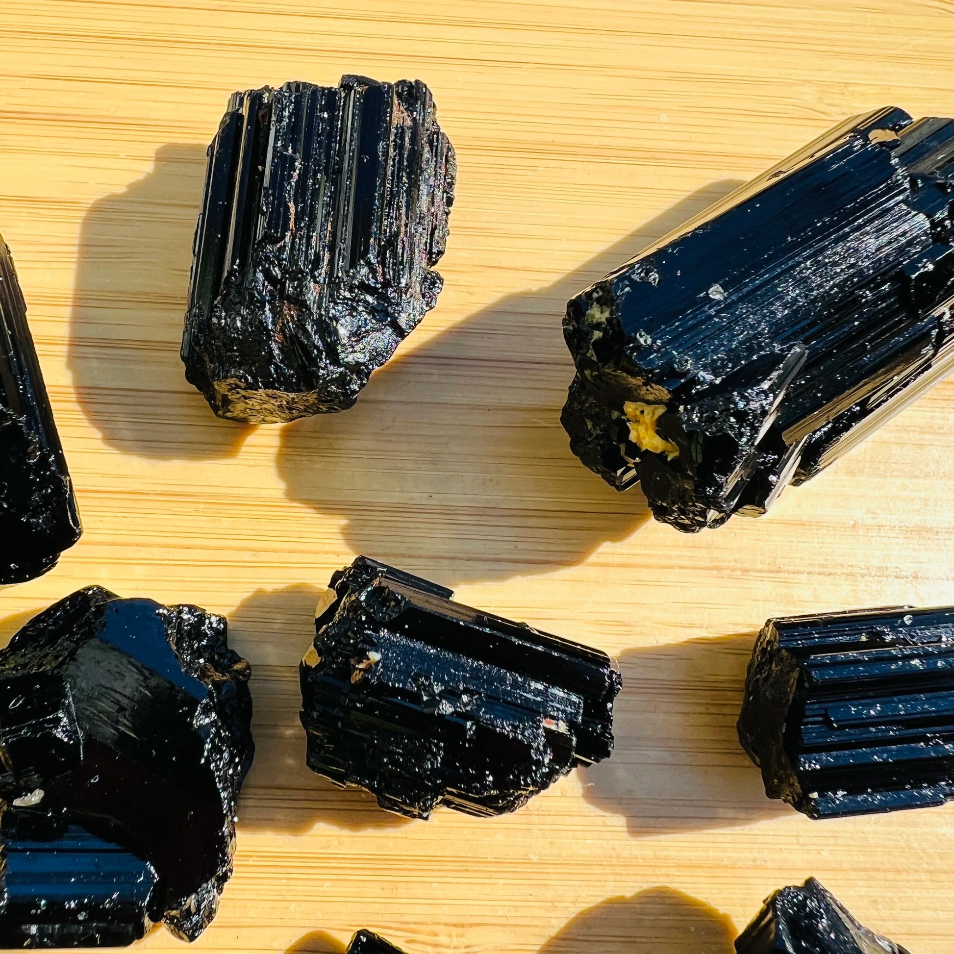 Back view of Grade AAA Black Tourmaline raw showing natural surface