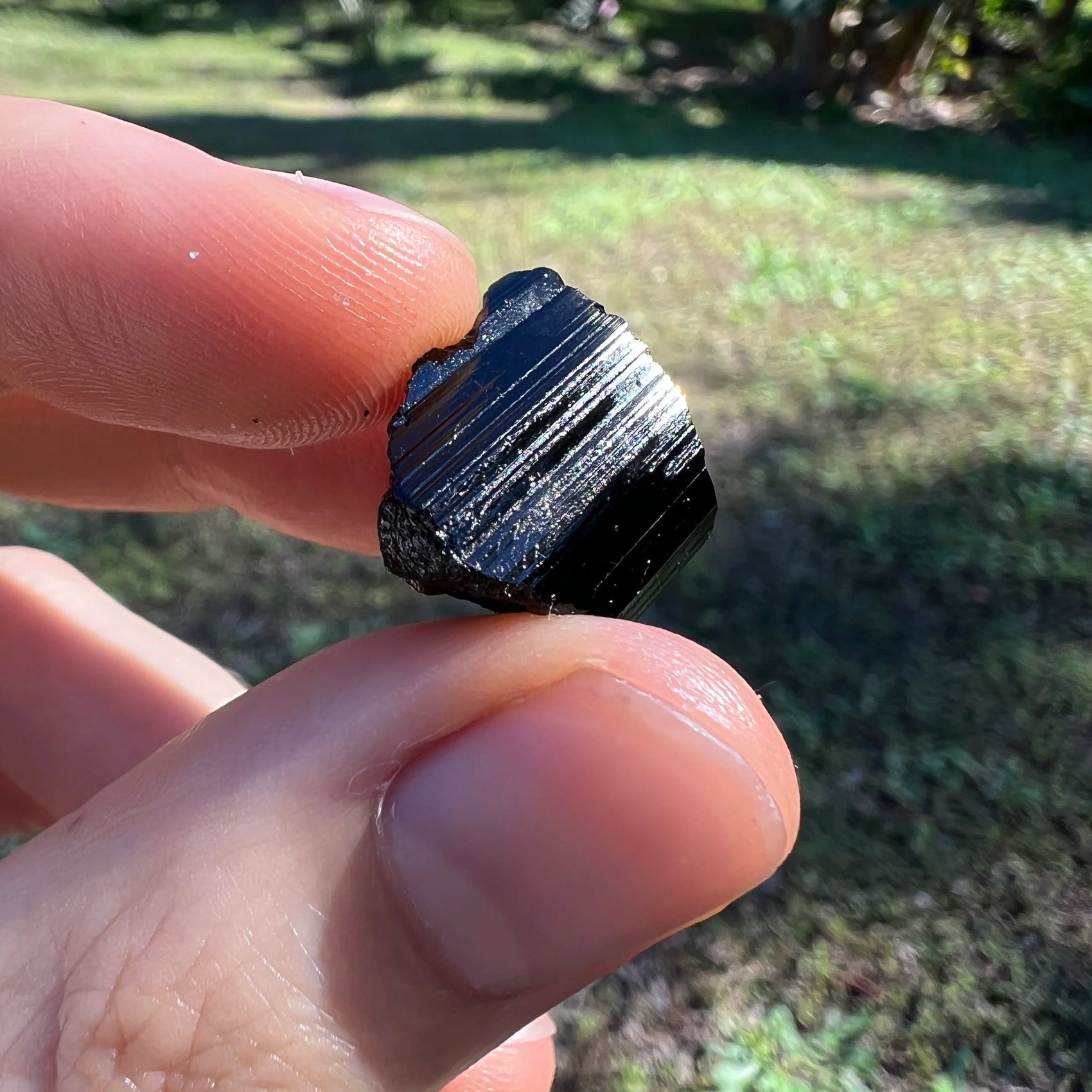 Black Tourmaline raw crystal from Madagascar with Black color, polished finish for mindful calm