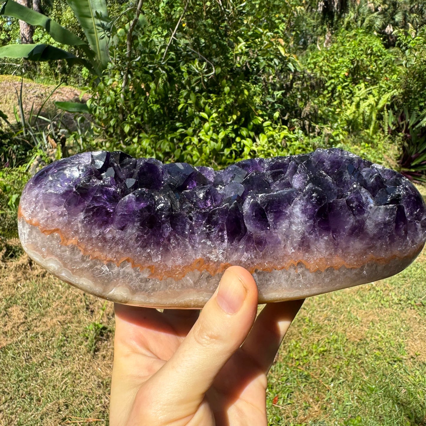 Back view of Grade AAA Amethyst geode showing natural surface
