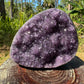 Near view of purple Amethyst raw geode, from Uruguay, showing subtle veining.