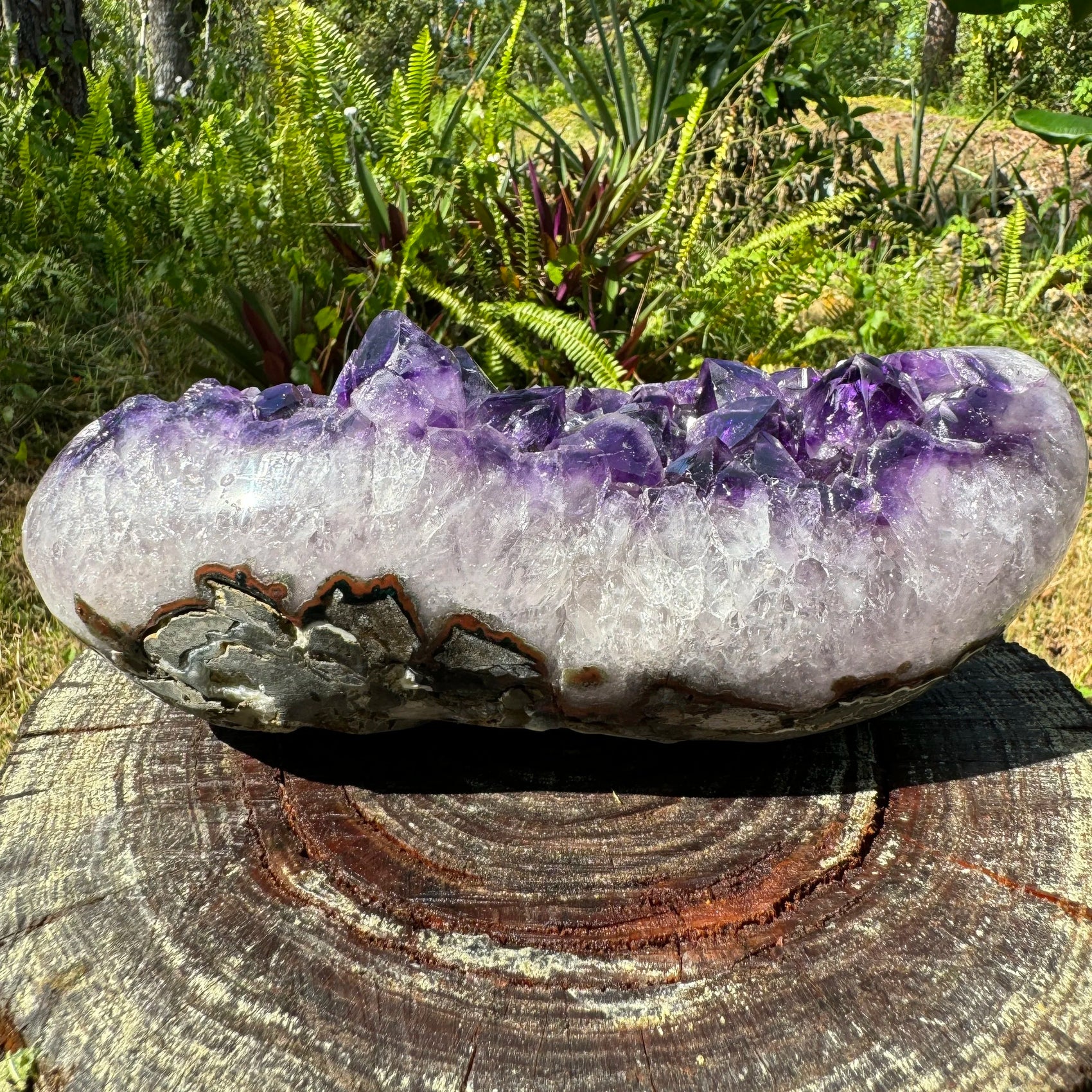 Alternate angle of Amethyst raw geode, showing natural variation, turned to for Stress Relief and Sleep.