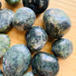 Opposite side of green Jade tumbled stone, from Lima, Peru, showing natural variation.