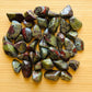 Back view of Grade AA Dragon Bloodstone tumbled stone showing natural surface