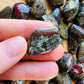 Full profile of Grade AA Dragon Bloodstone tumbled stone ready to ship from Beyond Bohemian