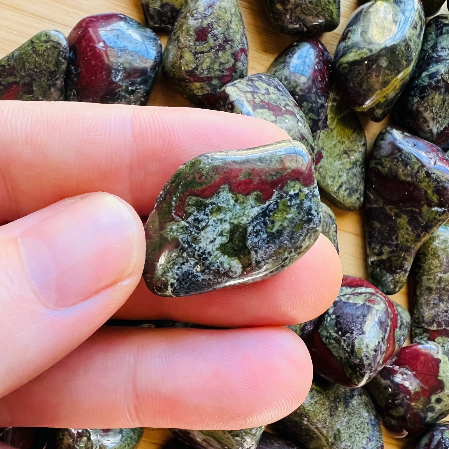 Full profile of Grade AA Dragon Bloodstone tumbled stone ready to ship from Beyond Bohemian