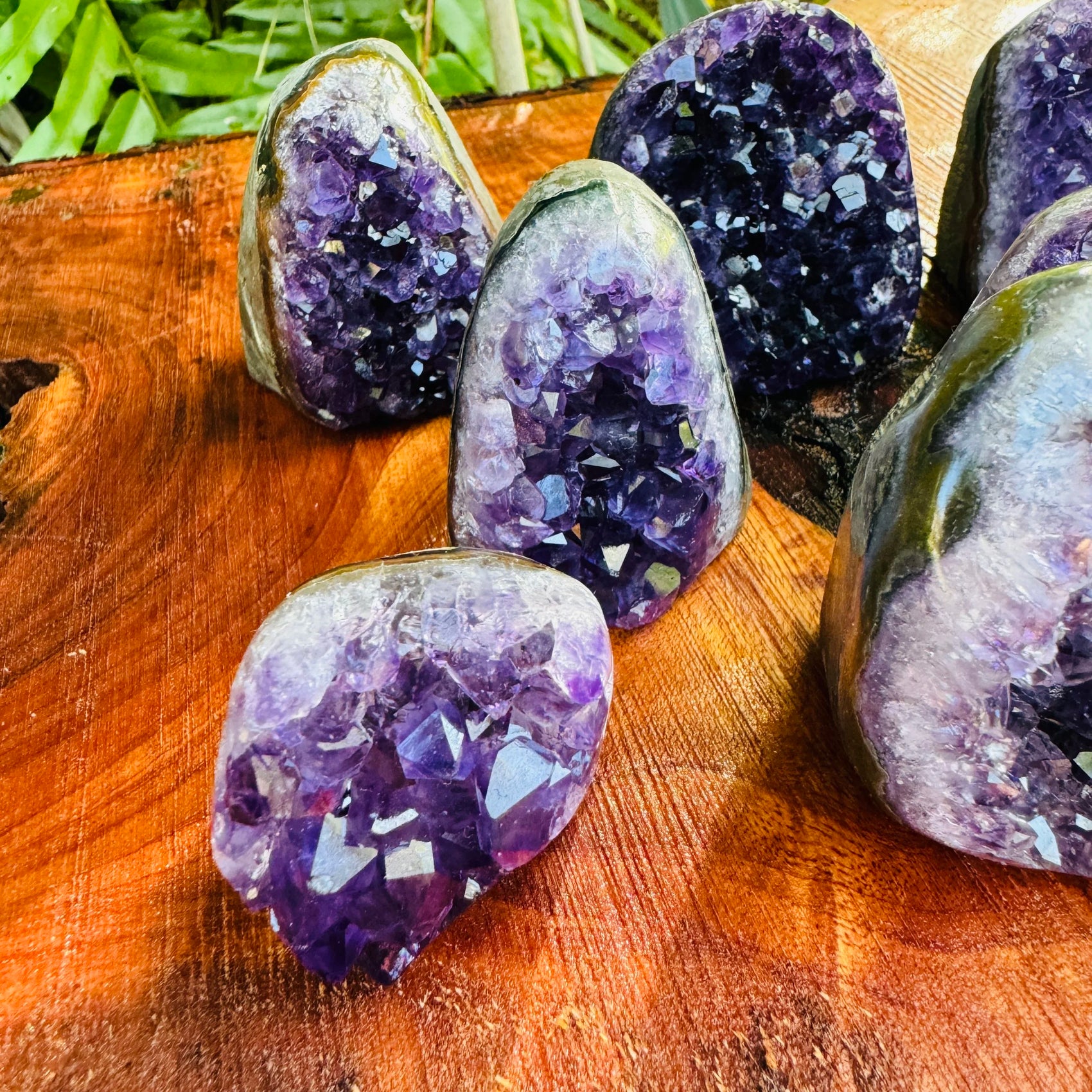Profile view of Amethyst raw geode, often paired with practices around Stress Relief and Sleep, sourced from Artigas, Uruguay.