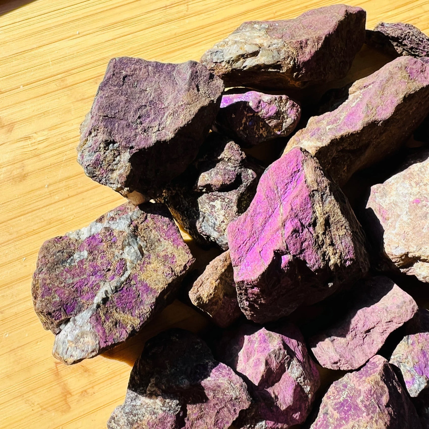 Profile view of Purpurite raw stone, from Erongo, Namibia, showing natural banding.