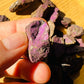 Back view of Grade A Purpurite raw showing natural surface