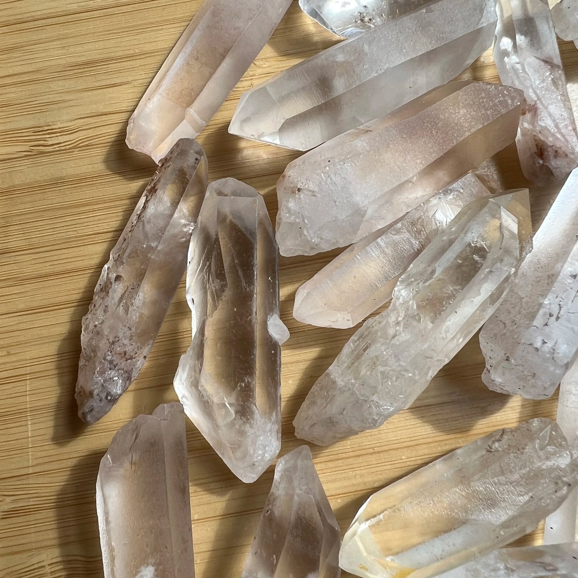 Profile view of Grade A Clear Quartz raw point, Madagascar-sourced.