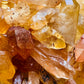 Back view of Grade AA Tangerine Quartz point showing natural surface