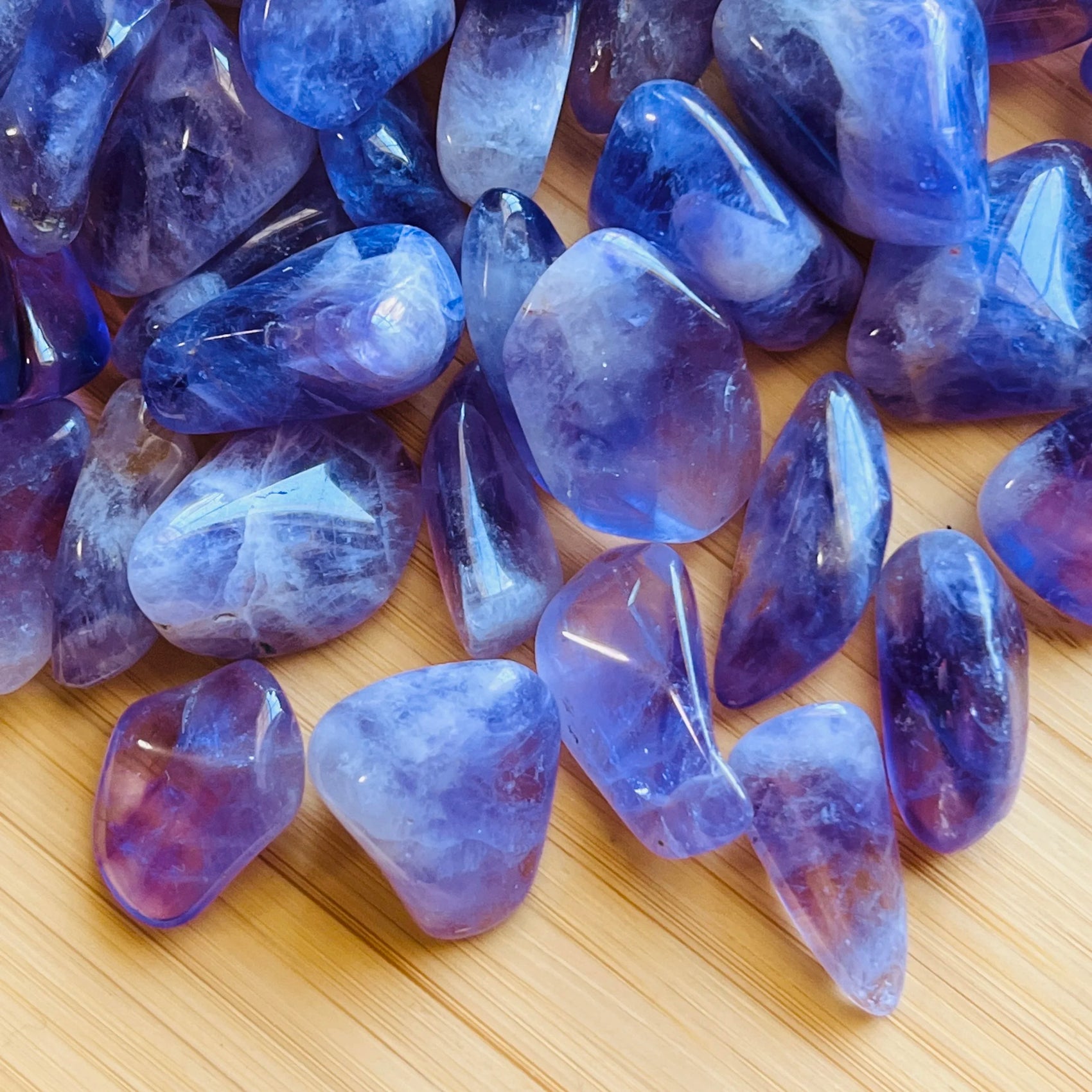 Near view of Amethyst tumbled stone, sourced from Madagascar.
