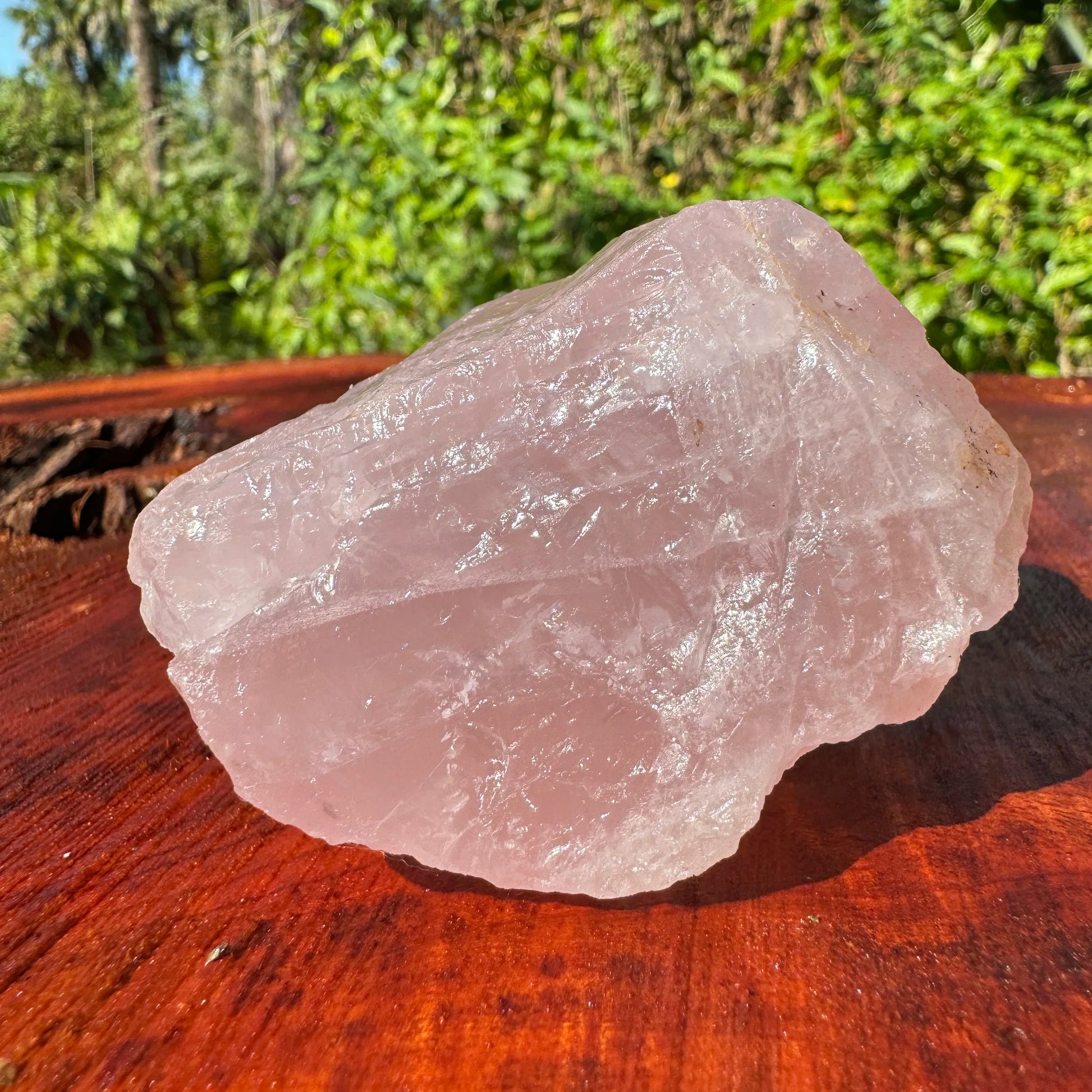 Profile view of Grade AAA Rose Quartz specimen, showing natural patina.