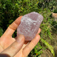 Back view of Grade AAA Rose Quartz specimen showing natural surface
