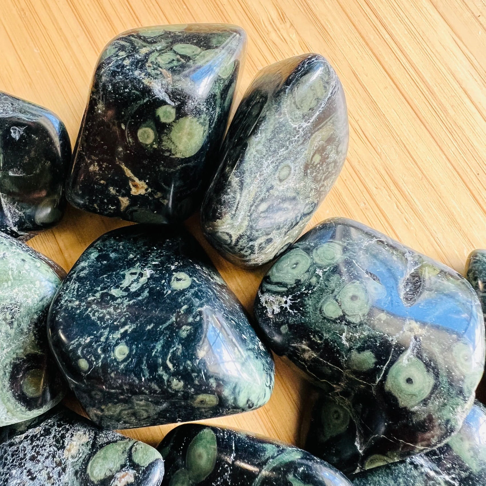 Bottom side of Kambaba Jasper tumbled stone, often worked with for Grounding, sourced from Bongolava, Madagascar.