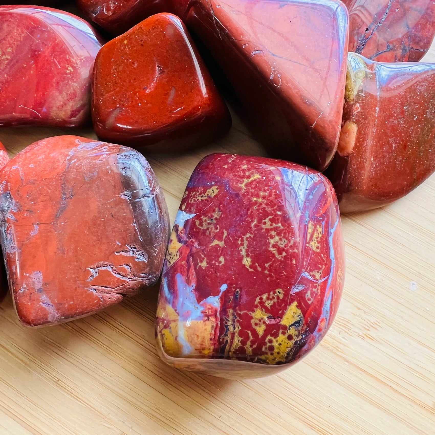 Plan view of Red Jasper tumbled stone, associated with Grounding.