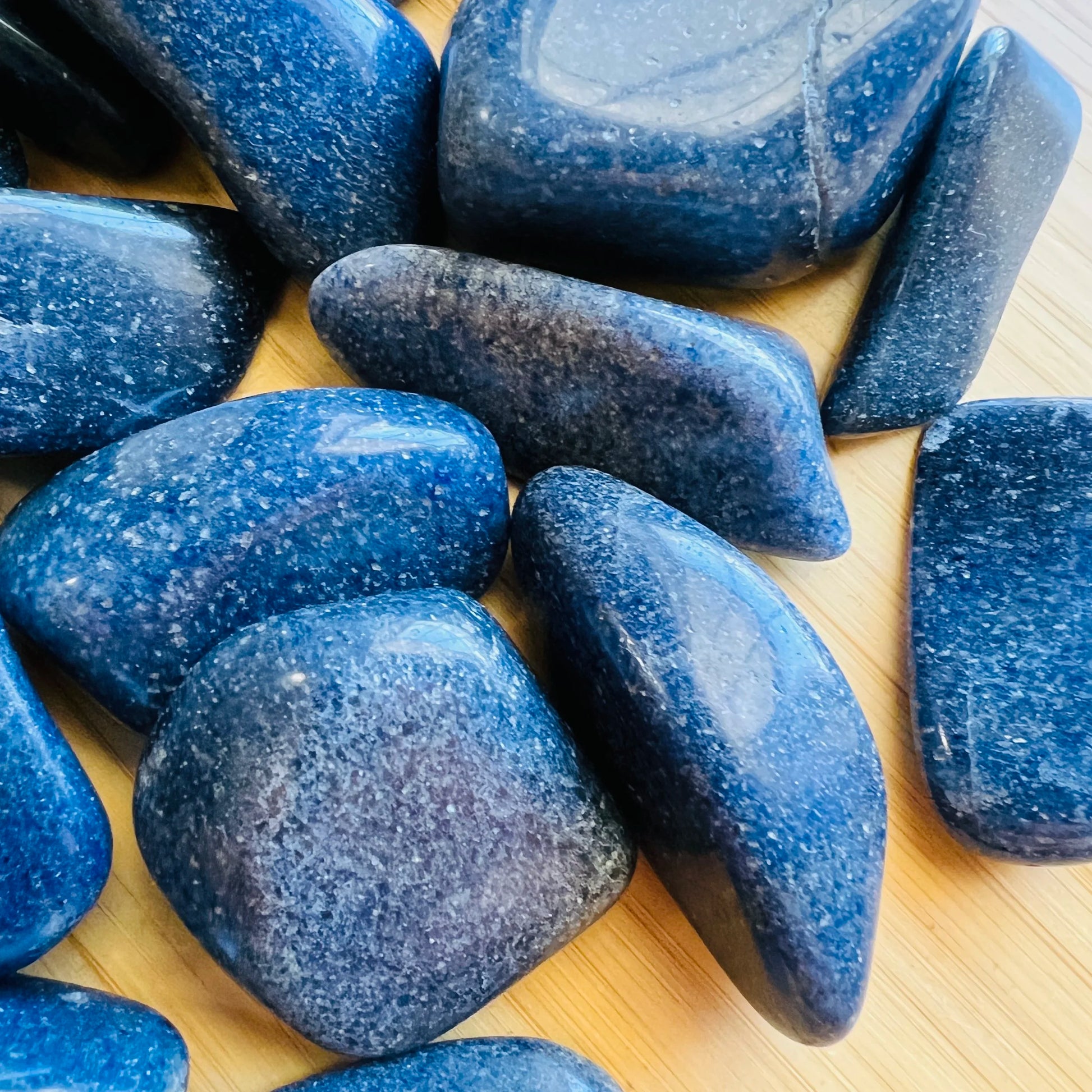 Bird's-eye view of Lazulite tumbled stone, often worked with for Intuition, from Madagascar.