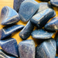 Underside detail of Lazulite tumbled stone, kept close for Intuition, sourced from Amoron'i Mania, Madagascar.