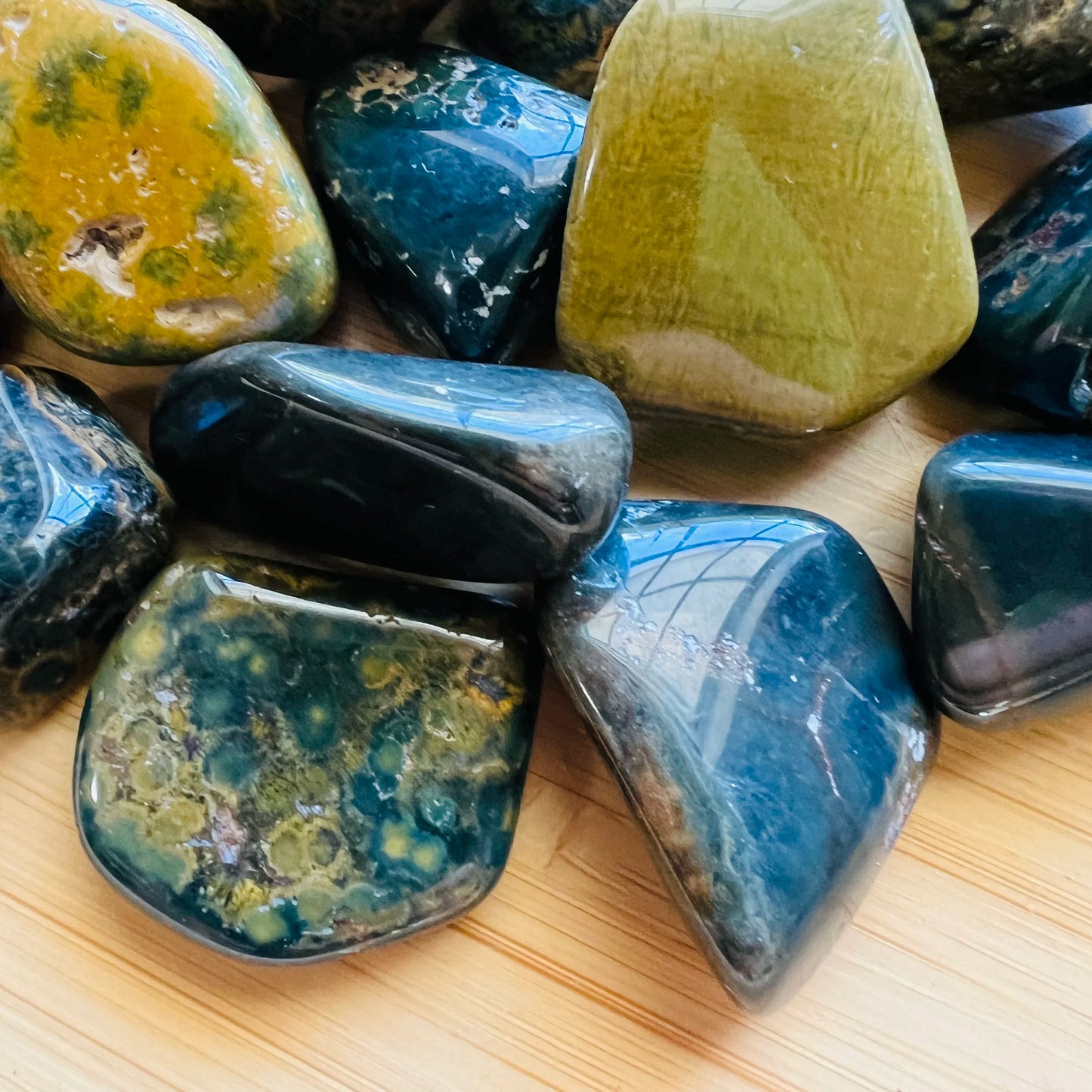 Underside view of Ocean Jasper tumbled stone, sourced from Sofia, Madagascar.