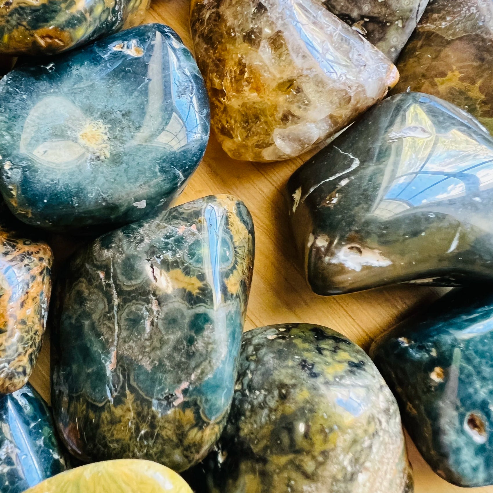Close detail of Ocean Jasper tumbled stone, showing subtle veining.