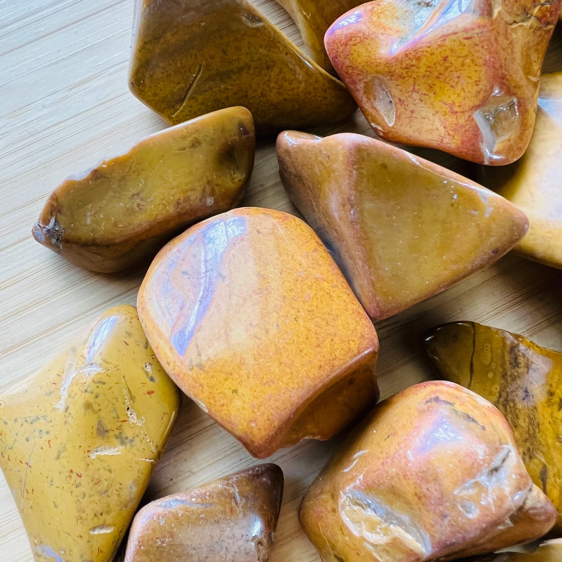Top view of Yellow Jasper tumbled stone, from Madagascar.