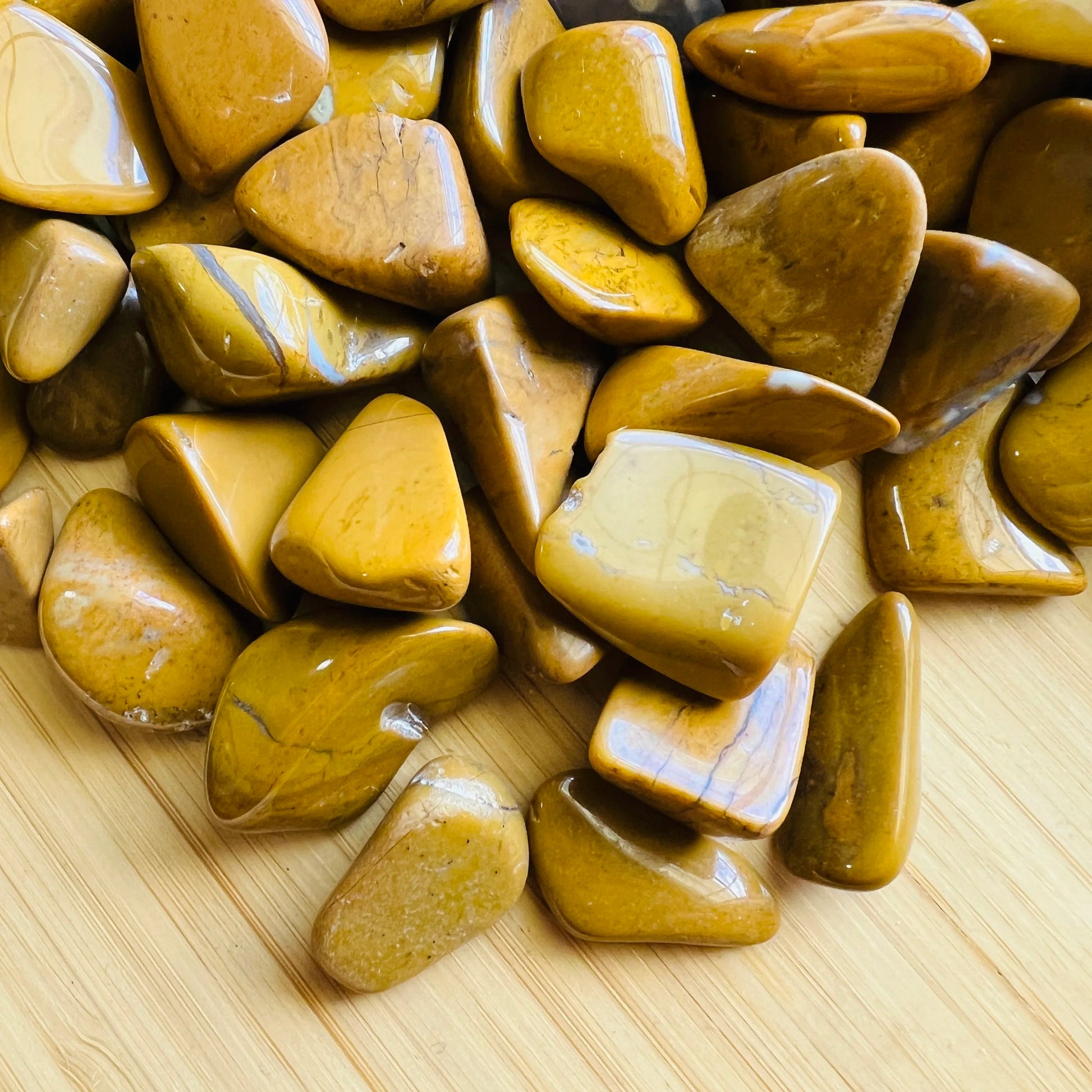 Field-of-view of Yellow Jasper tumbled stone, often kept for Energy, in the warmth of daylight.