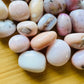 Detail capture of Pink Opal tumbled stone, showing characteristic patterning.