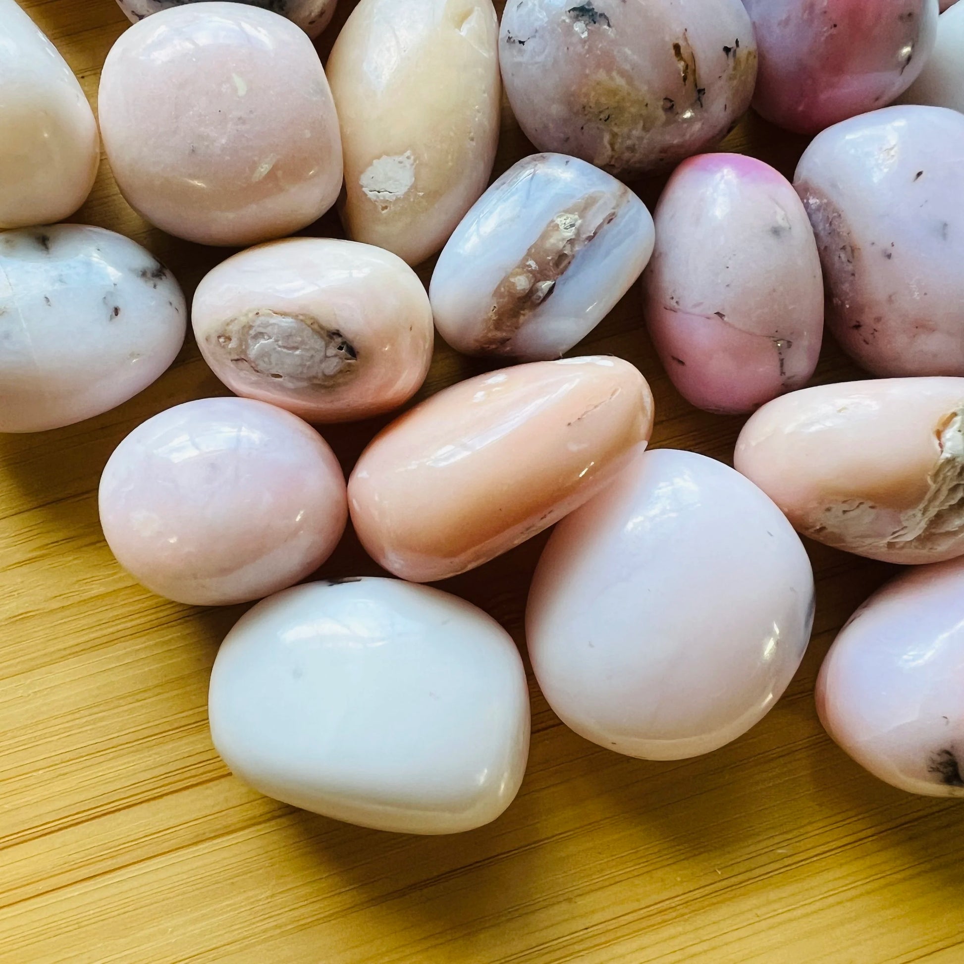 Detail capture of Pink Opal tumbled stone, showing characteristic patterning.