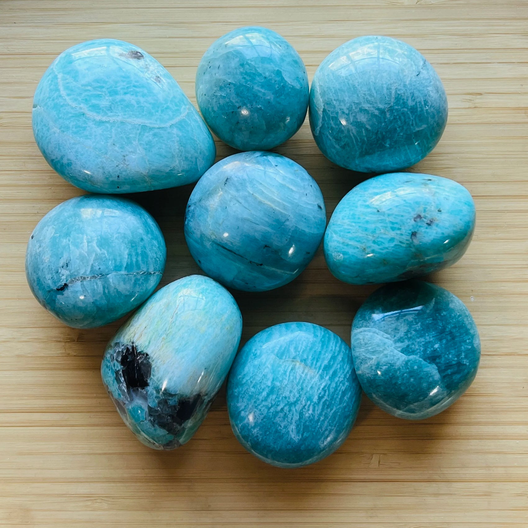 Amazonite palm stone in Blue, Green tones, ethically sourced from Madagascar for Emotional Healing and Stress Relief