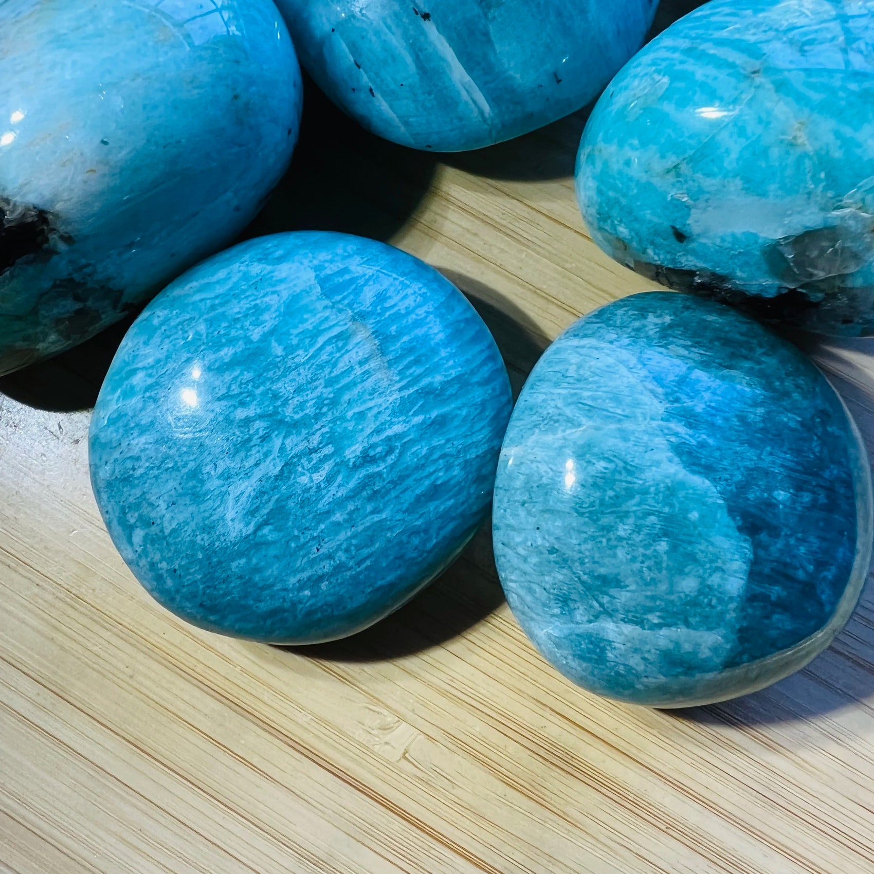 Close-up of Amazonite palm stone from Madagascar, soothing wellness stone for Emotional Healing