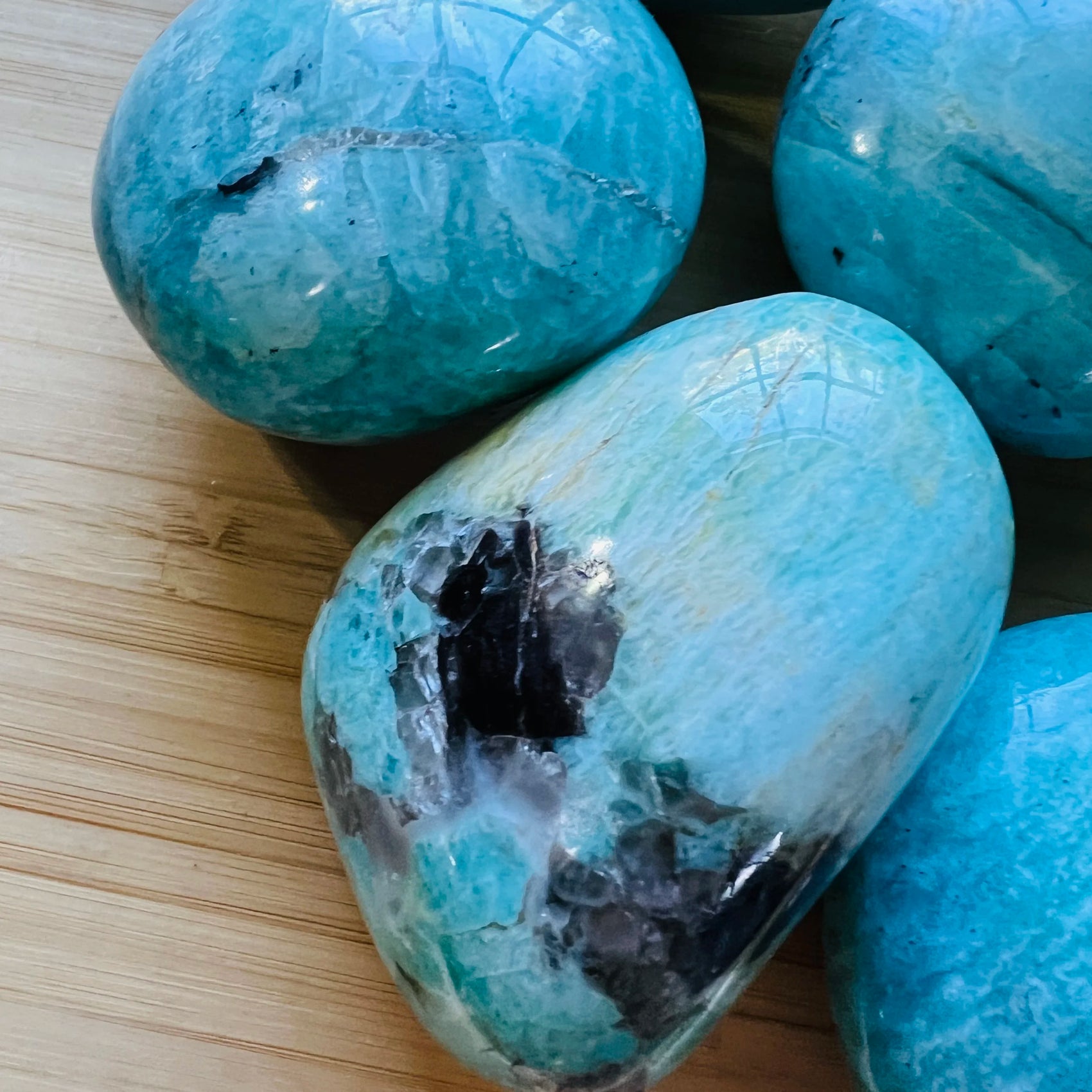 Amazonite palm stone from Madagascar with Blue, Green color, polished finish for mindful calm