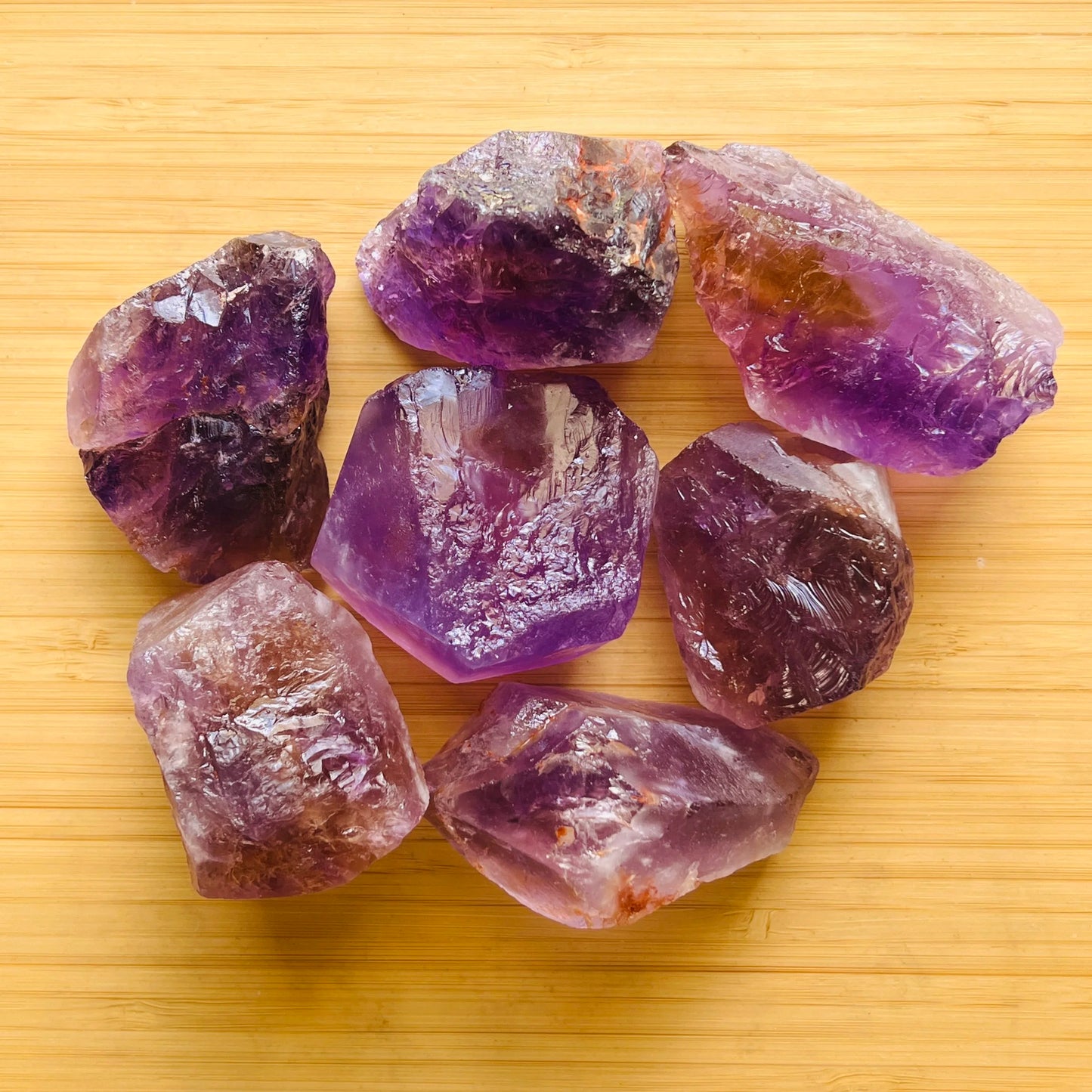 Detail shot of Grade AA Ametrine raw under natural light