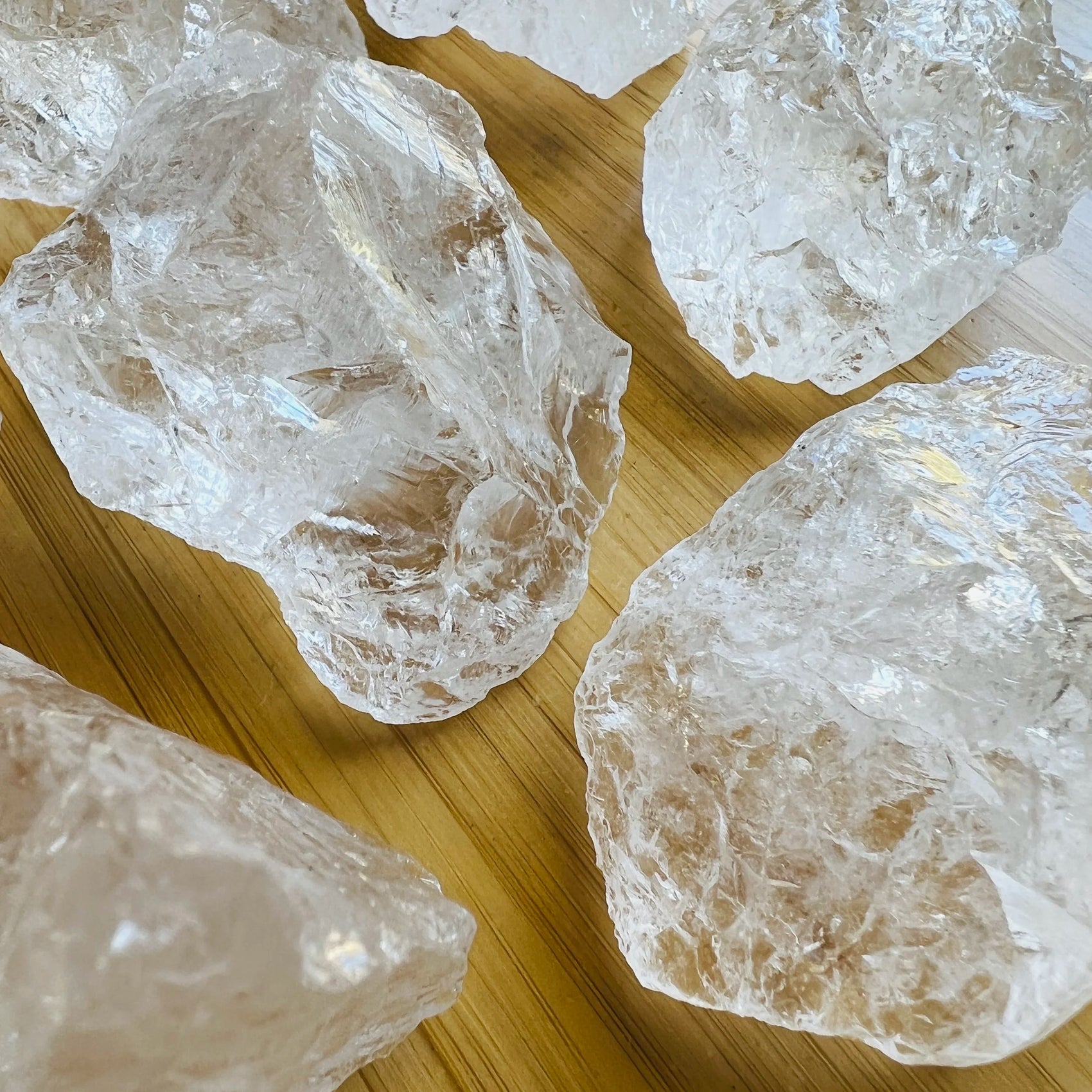 Detail shot showing Clear Quartz raw stone, sourced from Brazil, kept close for Cleansing and Meditation.