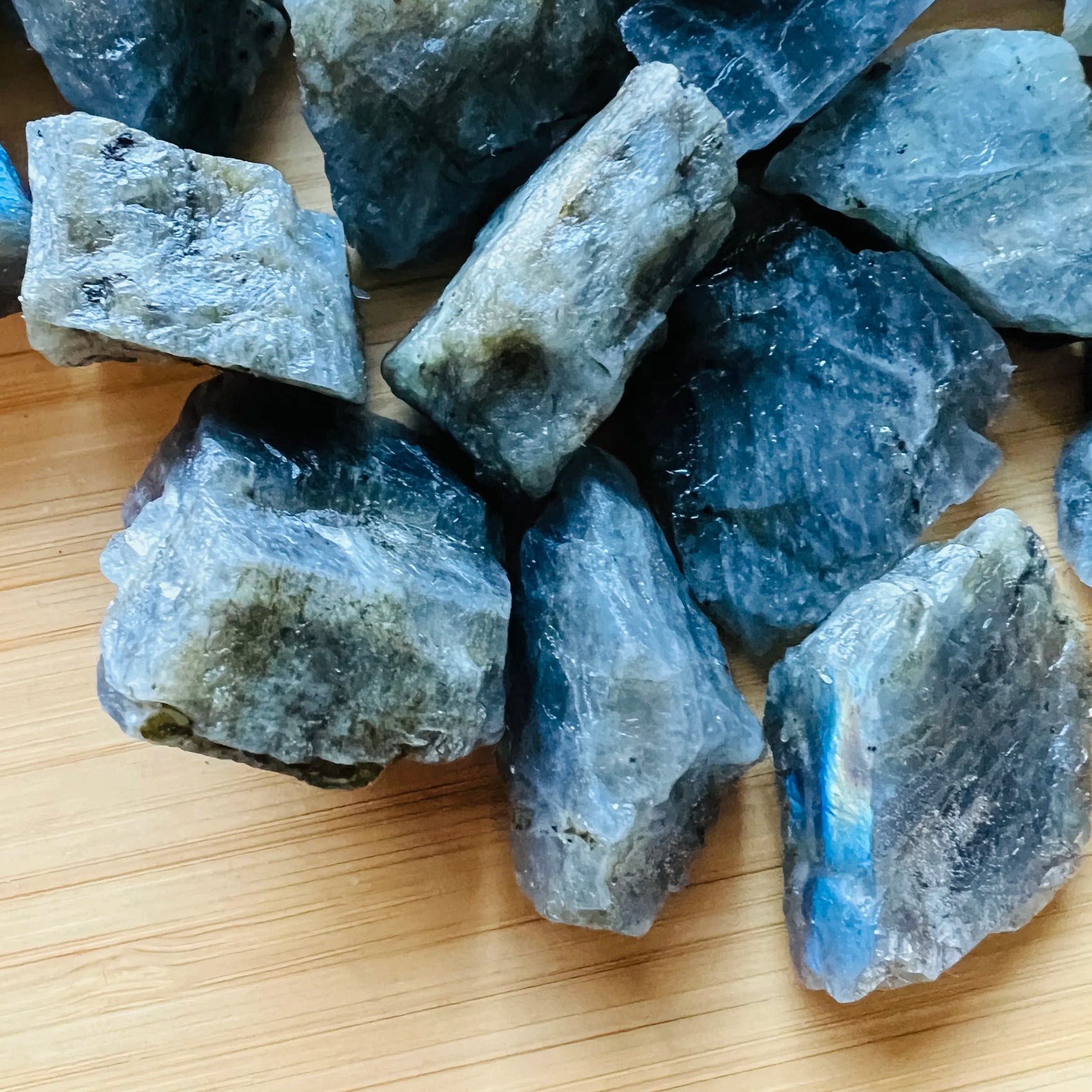 Profile view of Grade A Labradorite raw stone, showing natural sheen, sourced from Atsimo-Andrefana, Madagascar.