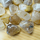 Back view of Grade AA Quartz tumbled stone showing natural surface