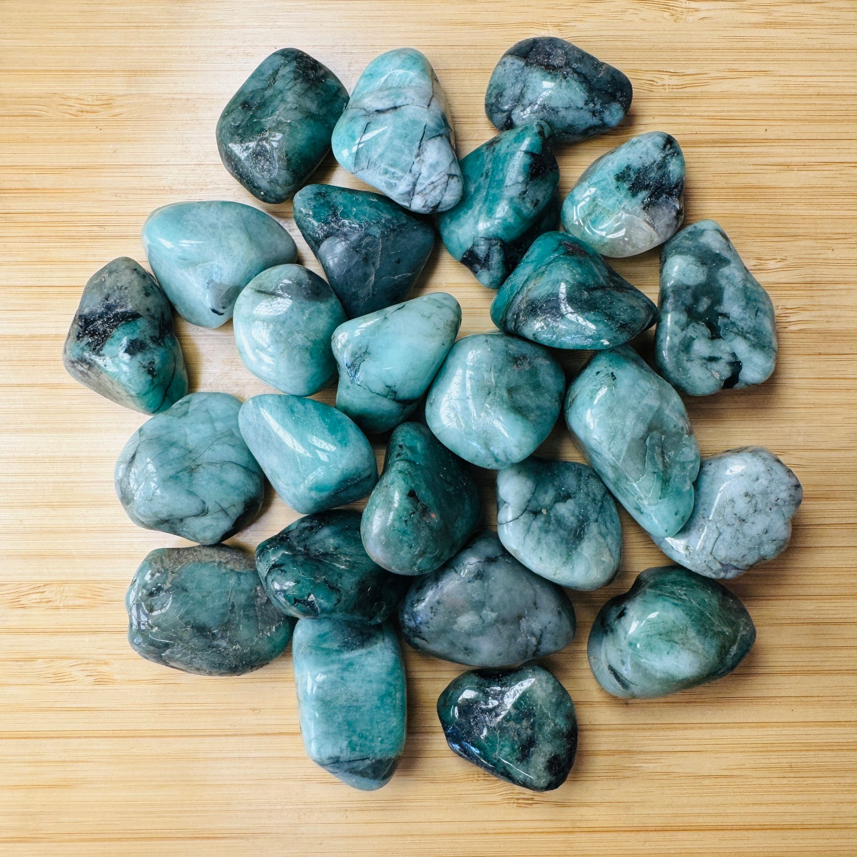 Emerald tumbled stone in Green tones, ethically sourced from Brazil for Healing and Emotional Healing