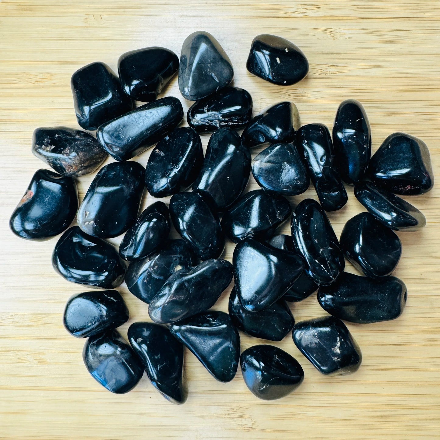 Black Onyx tumbled stone in Black tones, ethically sourced from Brazil for Protection and Focus