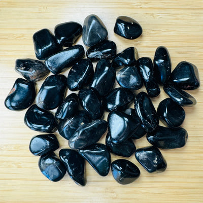 Black Onyx tumbled stone in Black tones, ethically sourced from Brazil for Protection and Focus