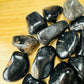 Handheld Black Onyx tumbled stone from Brazil for meditation, Protection and Focus
