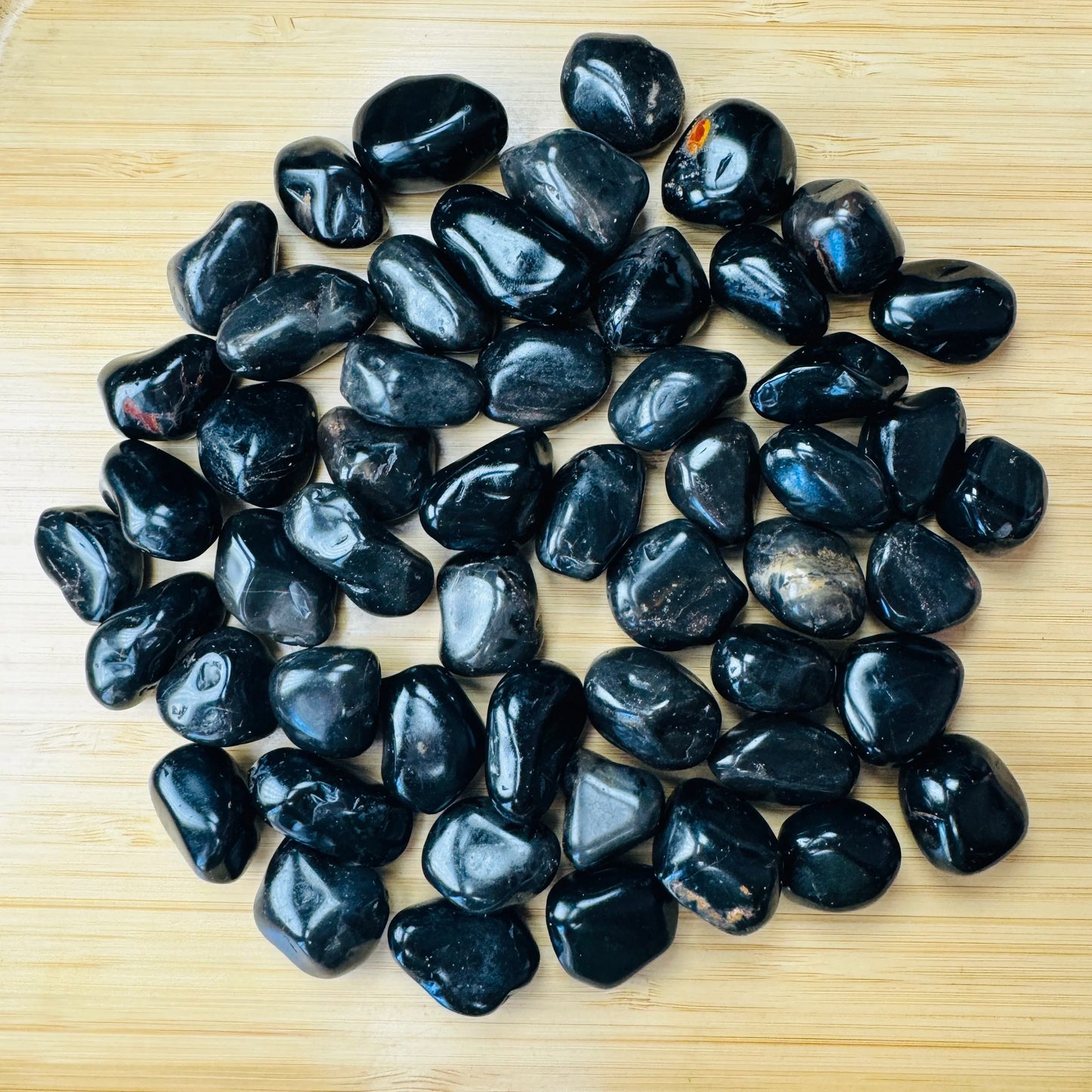 Black Onyx tumbled stone in Black tones, ethically sourced from Brazil for Protection and Focus