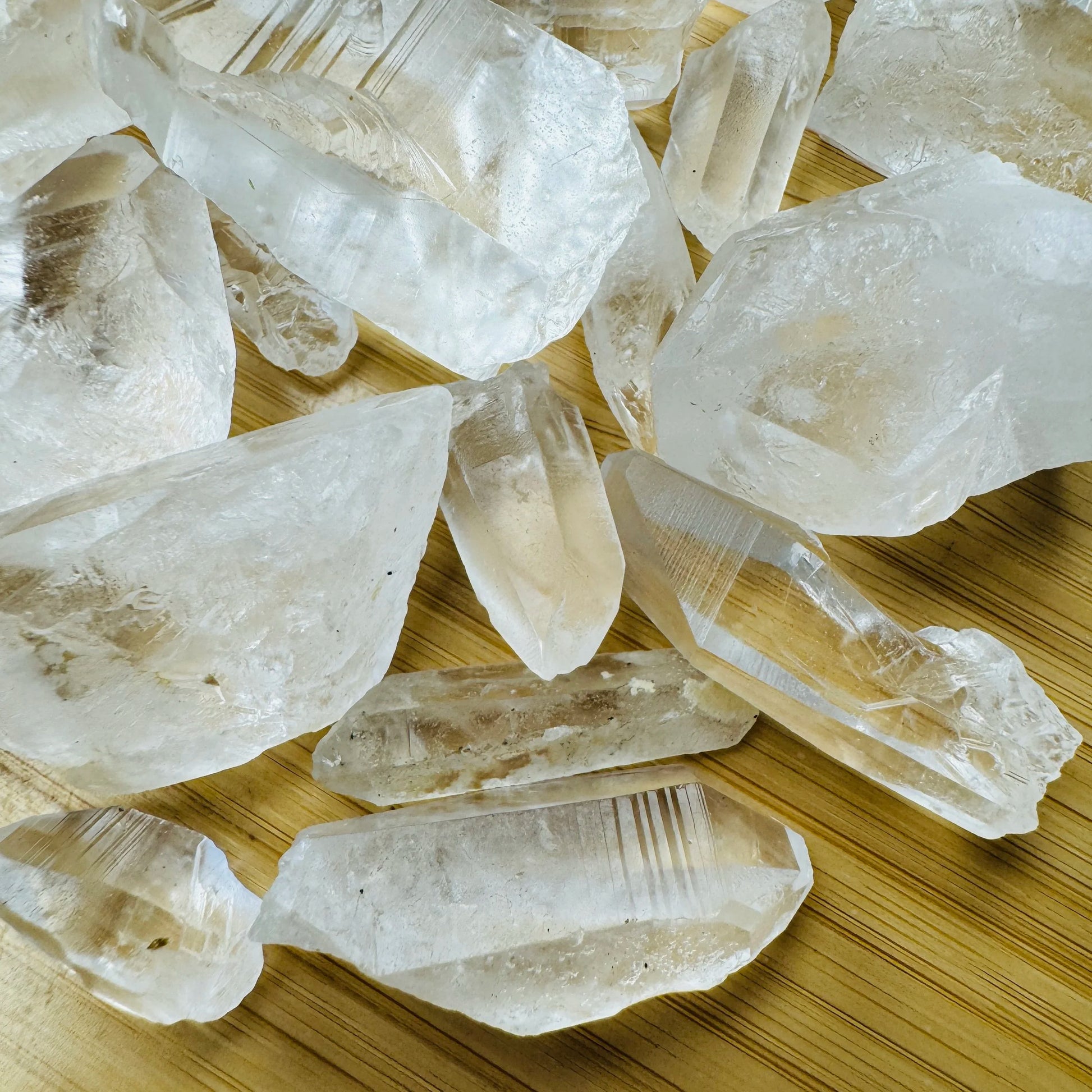 Close-up detail of Grade AA Lemurian Quartz point showing natural clear tones and texture